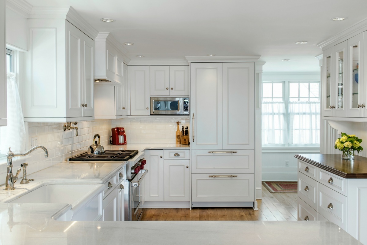 How to Hide a Washer and Dryer in the Kitchen with Style and Function